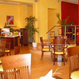 Sala colazione nel ristorante Larat Fotos