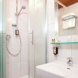 Camera da bagno Best Western Neue Post Fotos