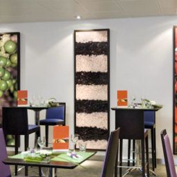 Salle du petit-déjeuner située dans le restaurant Novotel Lyon Bron Fotos