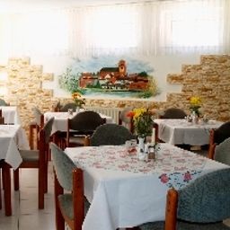 Salle du petit-déjeuner située dans le restaurant Kirschstein Fotos