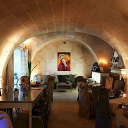 Salle du petit-déjeuner située dans le restaurant Villa Regalido Fotos