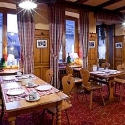 Salle du petit-déjeuner La Charrue Logis Fotos
