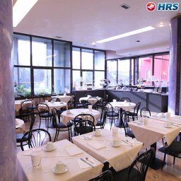Breakfast room within restaurant Martini Fotos