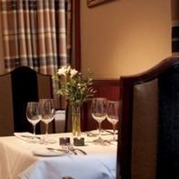 Salle du petit-déjeuner située dans le restaurant Channings Fotos