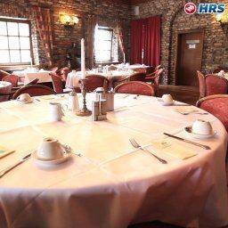 Breakfast room within restaurant De Poort Sporthotel Fotos