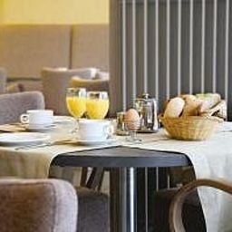 Frühstücksraum im Restaurant Burlington Fotos