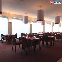 Sala de desayuno en el restaurante Rotterdam Fotos