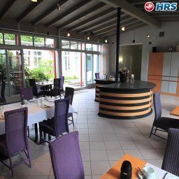 Salle du petit-déjeuner située dans le restaurant Villa Anna Boutique-Hotel Fotos