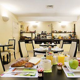 Salle du petit-déjeuner située dans le restaurant ibis Styles Nantes Centre Place Royale (ex all seasons) Fotos