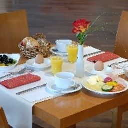 Salle du petit-déjeuner Best Western ApartHotel Fotos