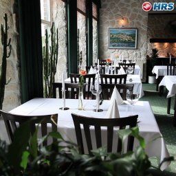 Salle du petit-déjeuner située dans le restaurant A.L. Harzhotel Fuenf Linden Fotos
