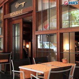 Salle du petit-déjeuner située dans le restaurant Goldener Schlüssel Fotos