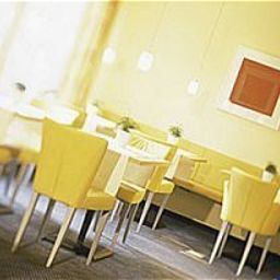 Salle du petit-déjeuner située dans le restaurant Uhu Garni Fotos