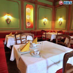 Salle du petit-déjeuner située dans le restaurant Leopold Fotos