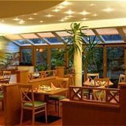 Salle du petit-déjeuner située dans le restaurant Astralis  Domizil Fotos