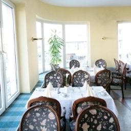 Breakfast room within restaurant Central Garni Fotos