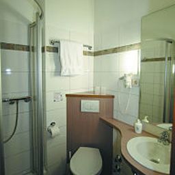 Camera da bagno Postkutsche Garni Fotos