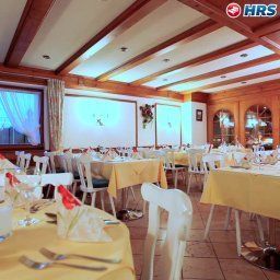 Sala de desayuno en el restaurante Alpenrose Fotos