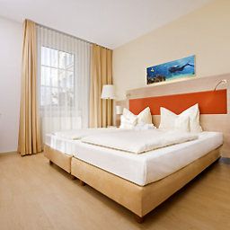 Номер Mercure Hotel Muenchen Airport Aufkirchen Fotos