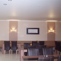 Sala de desayuno en el restaurante Metropol Fotos