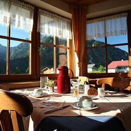 Sala colazione nel ristorante IFA Alpenrose Fotos