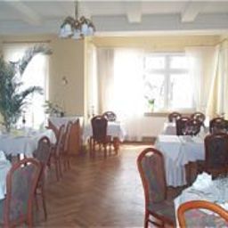 Salle du petit-déjeuner située dans le restaurant Bellevue Fotos