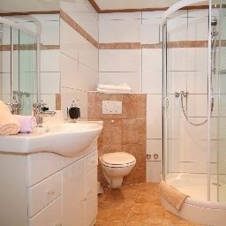 Cuarto de baño Hotel Feneberg Fotos