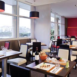 Sala de desayuno en el restaurante Novotel Nantes Centre Bord de Loire Fotos