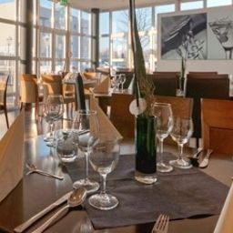 Salle du petit-déjeuner située dans le restaurant TRYP Dortmund Hotel Fotos