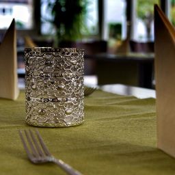 Salle du petit-déjeuner située dans le restaurant Ambiente Fotos