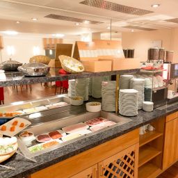 Breakfast room friendly cityhotel Fotos