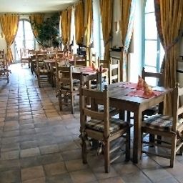 Breakfast room within restaurant Albergo Fotos