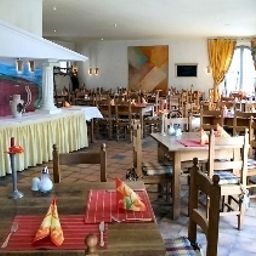 Breakfast room within restaurant Albergo Fotos