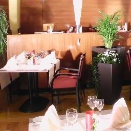 Salle du petit-déjeuner située dans le restaurant Welcome Fotos