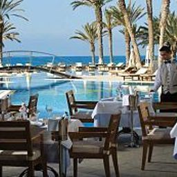 Sala de desayuno en el restaurante Constantinou Bros Asimina Suites Hotel Fotos