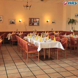 Sala de desayuno en el restaurante Comfort Weißensee Fotos