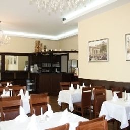 Salle du petit-déjeuner située dans le restaurant Europa City Fotos