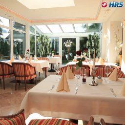 Salle du petit-déjeuner située dans le restaurant Angerhof Kur- und Sporthotel Fotos