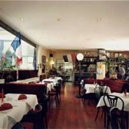 Sala de desayuno en el restaurante Hotel de France Centre Francais Fotos