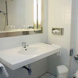 Camera da bagno Stadthotel Oranienburg Fotos