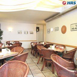Sala de desayuno en el restaurante Zur Sonne Fotos