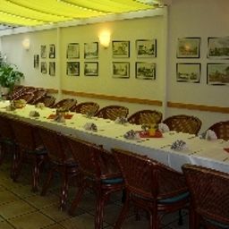 Sala de desayuno en el restaurante Zur Sonne Fotos