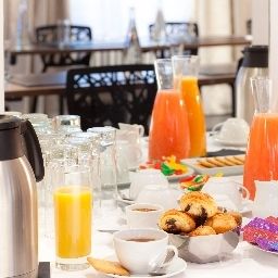 Комната для завтраков Mon Hotel Fotos