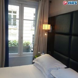 Номер Mon Hotel Fotos
