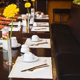 Sala colazione nel ristorante GHOTEL hotel & living Fotos