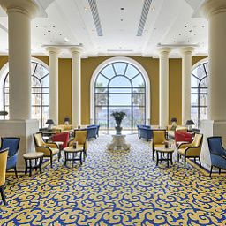 Hall Corinthia Hotel St George's Bay Fotos