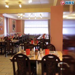 Salle du petit-déjeuner située dans le restaurant Rössli Fotos