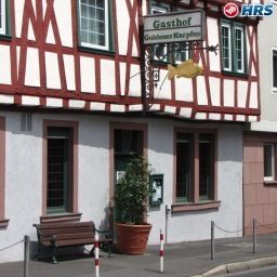 Vista exterior Goldener Karpfen Fotos