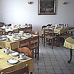 Salle du petit-déjeuner enjoyHotel Fotos