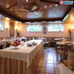 Sala de desayuno en el restaurante Marias Inn Garni Fotos